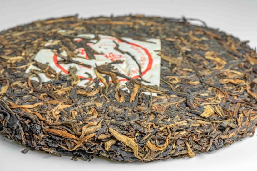 Xigui Manglu Mountain Gushu Tree Cake 2009 - 400g - Váha: 50g