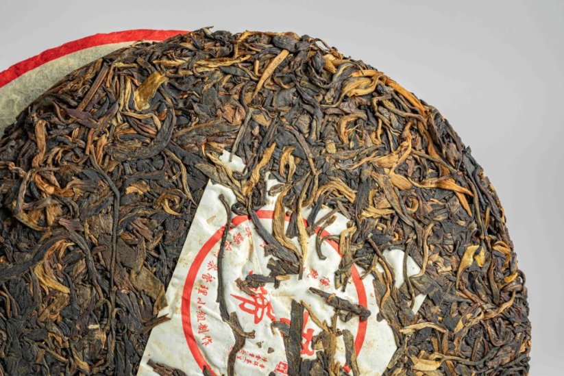 Xigui Manglu Mountain Gushu Tree Cake 2009 - 400g - Váha: 50g